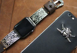 Apple Watch strap with a sculpted samurai pendant