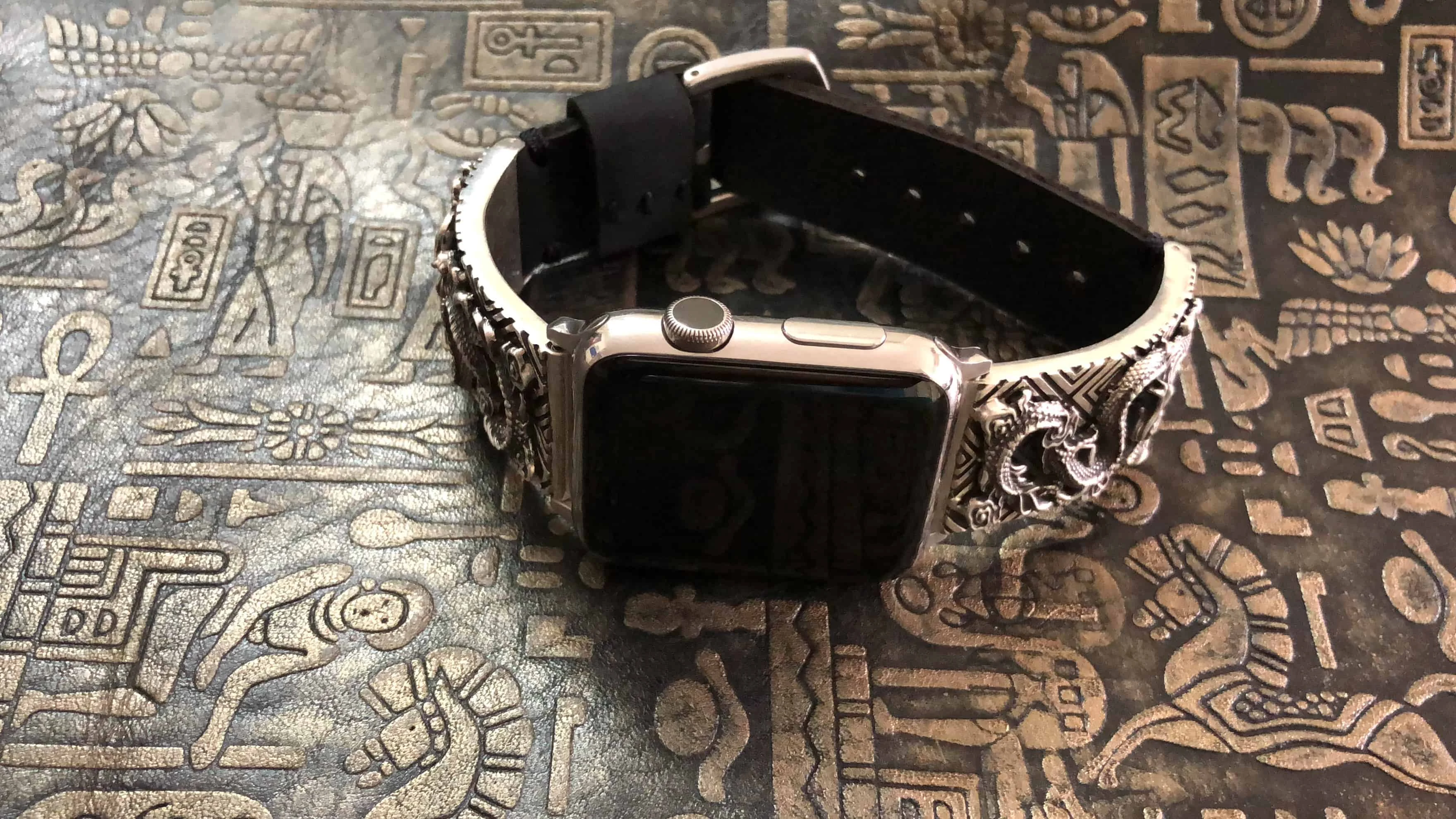 Silver dragon bracelet on an Apple Watch